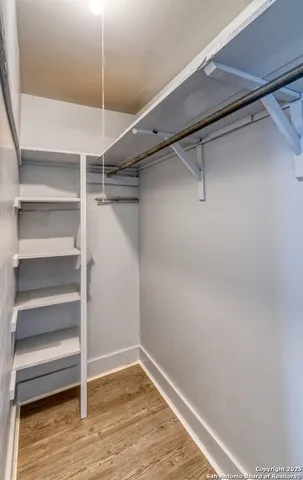 a view of an empty walk in closet