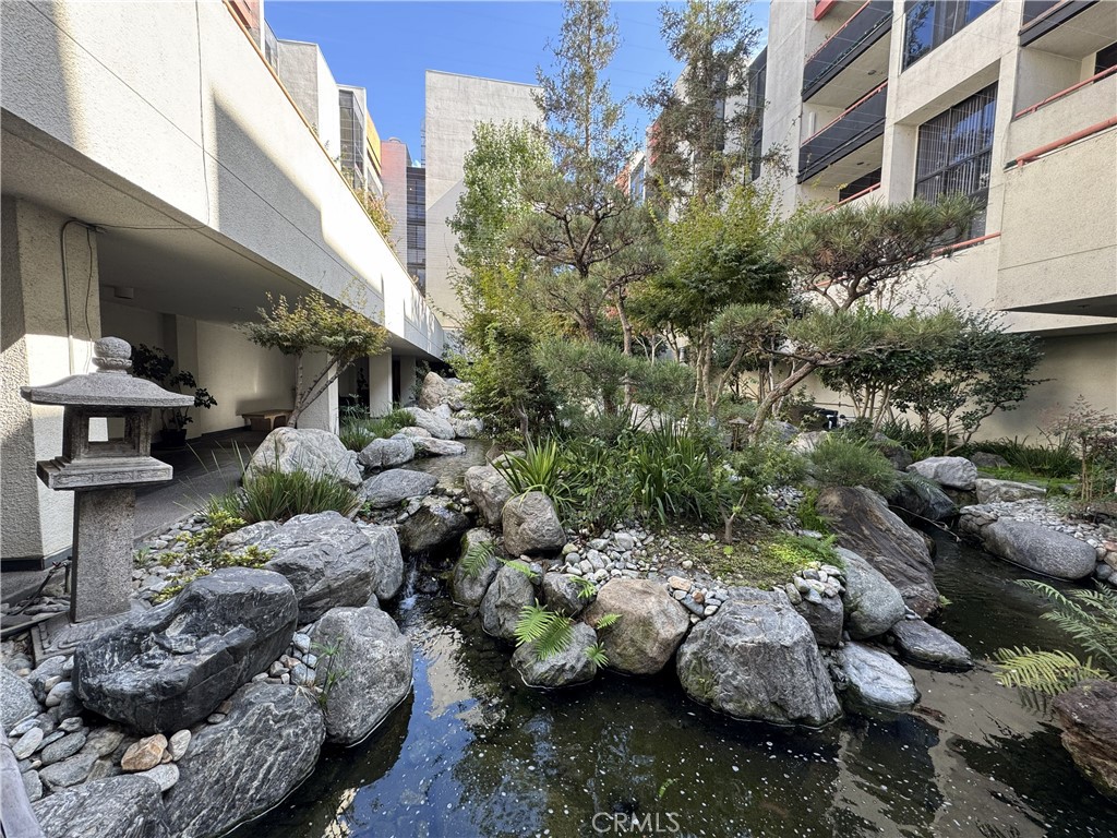 222 South Central Avenue, Unit 214 Los Angeles, CA 90012 - Photo 16 of 21 a view of a street with flower plants