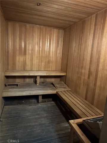 a view of room with wooden floor