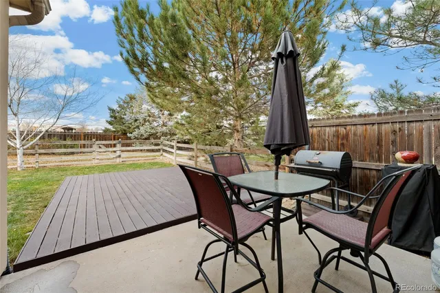 a view of a chairs and table on the terrace
