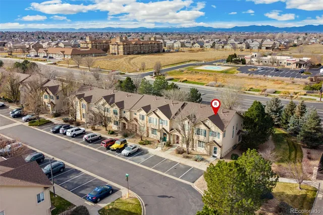 an aerial view of residential building and lake view