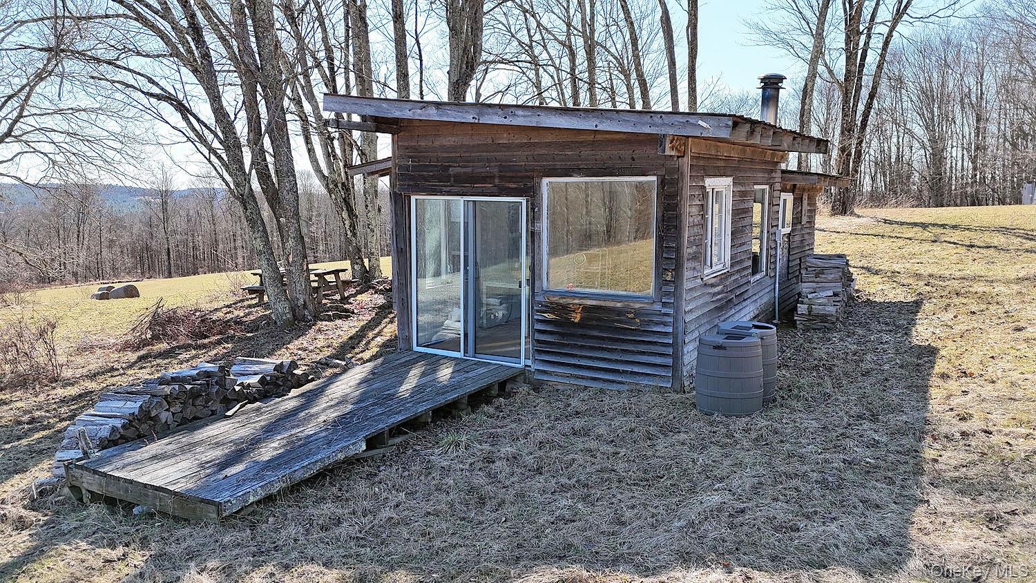 57 Boettger Road Callicoon, NY 12723 - Photo 5 of 22 Deck to sliding doors