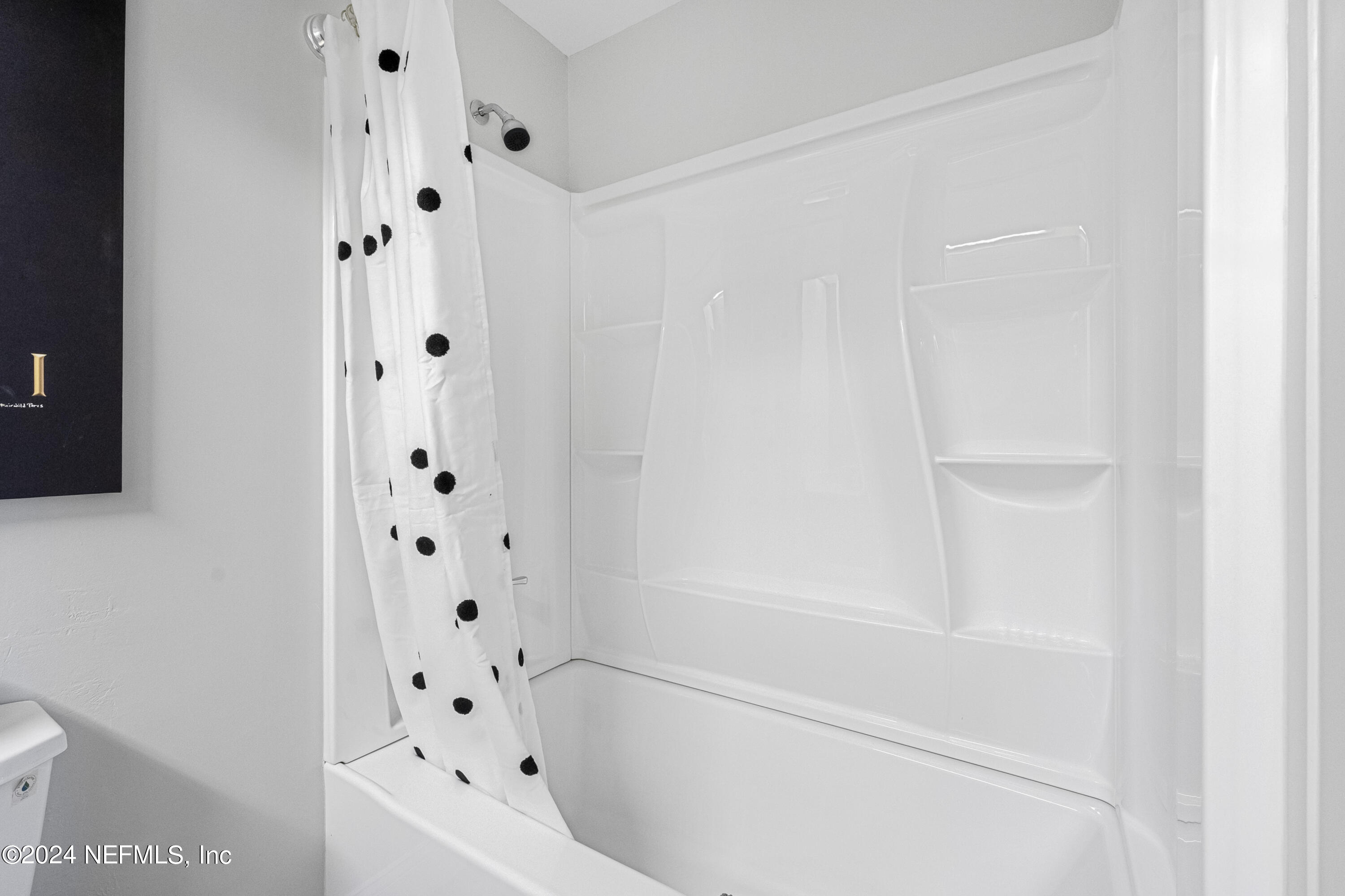 8118 Baymeadows Circle East, Unit 5 Jacksonville, FL 32256 - Photo 22 of 23 a bathroom with bathtub with toilet