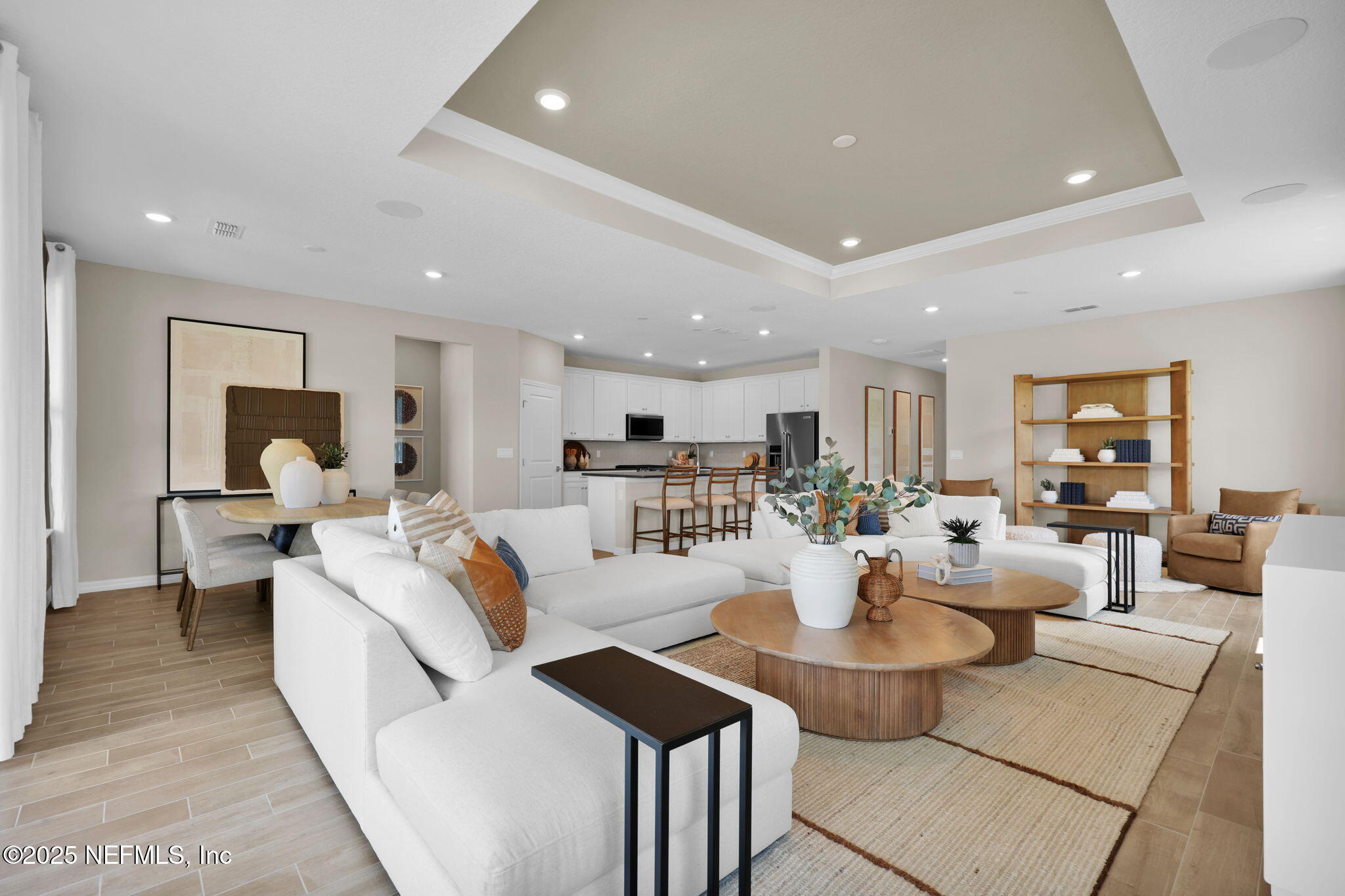 963 Floco Avenue Yulee, FL 32097 - Photo 13 of 47 a living room with furniture kitchen view and a large window