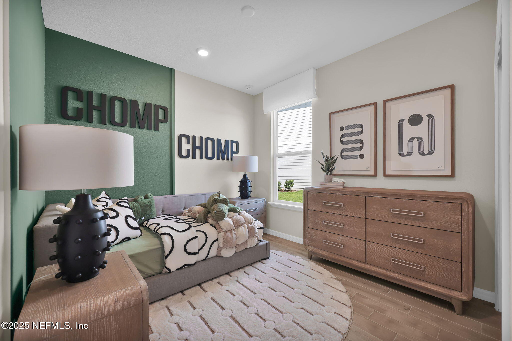 963 Floco Avenue Yulee, FL 32097 - Photo 20 of 47 a bedroom with furniture and a window