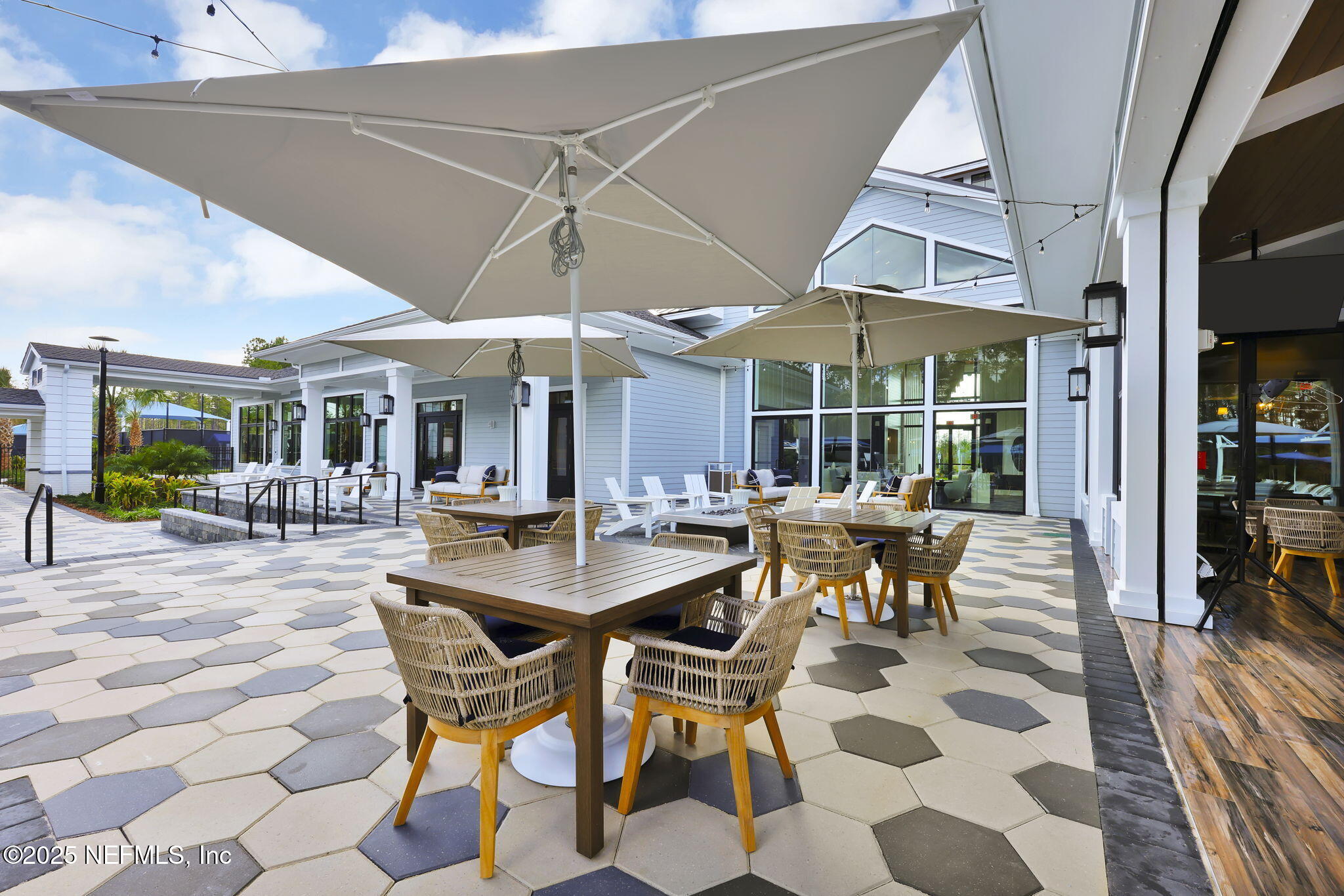 963 Floco Avenue Yulee, FL 32097 - Photo 32 of 47 a patio with a table and chairs