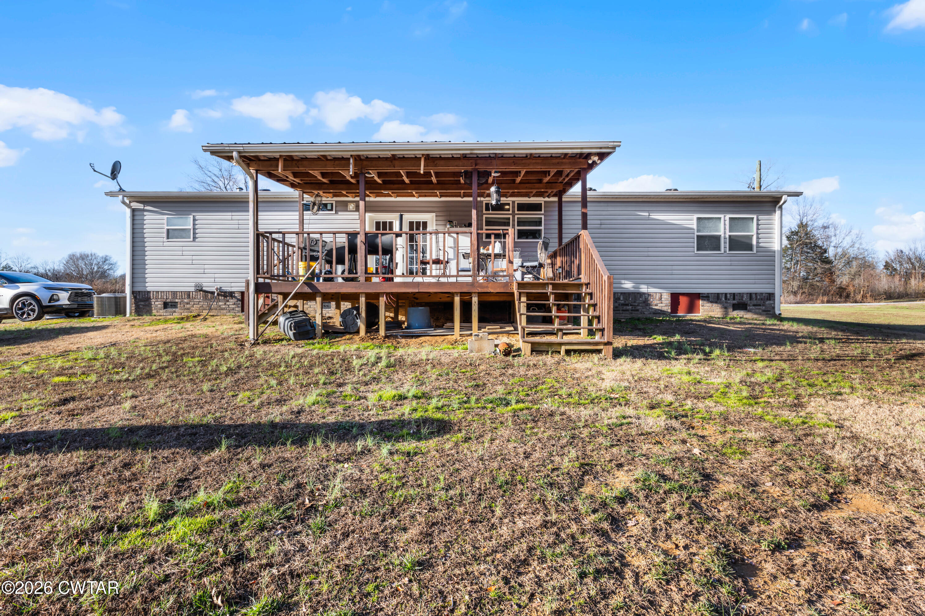 77 Vernon White Road Bradford, TN 38316 - Photo 19 of 24 a front view of a house with a yard