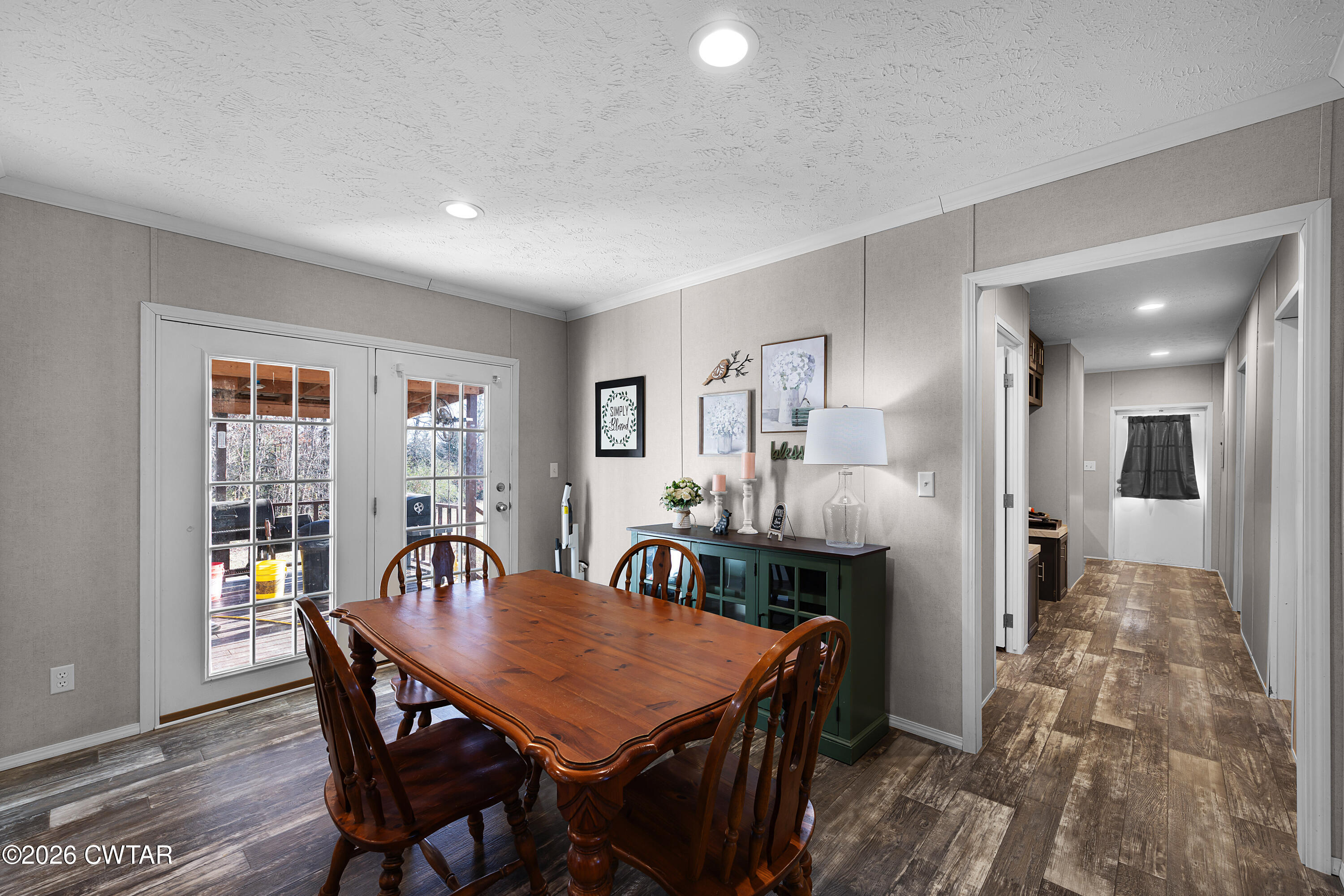 77 Vernon White Road Bradford, TN 38316 - Photo 8 of 24 a view of a dining room with furniture and a table