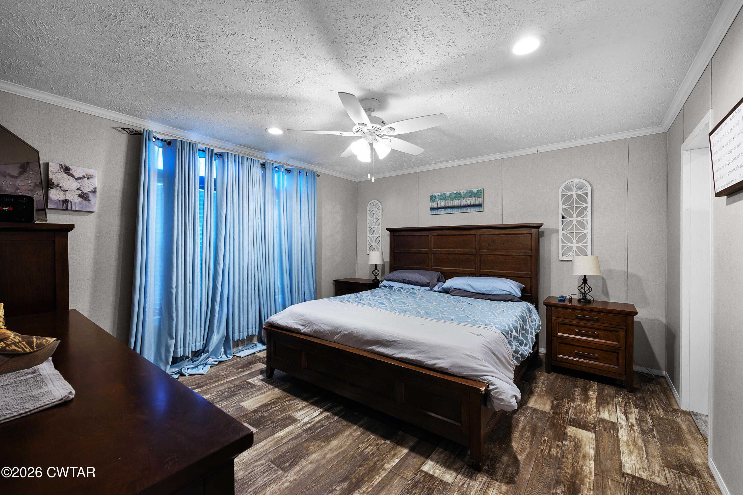 77 Vernon White Road Bradford, TN 38316 - Photo 9 of 24 a bedroom with bed and wooden floor