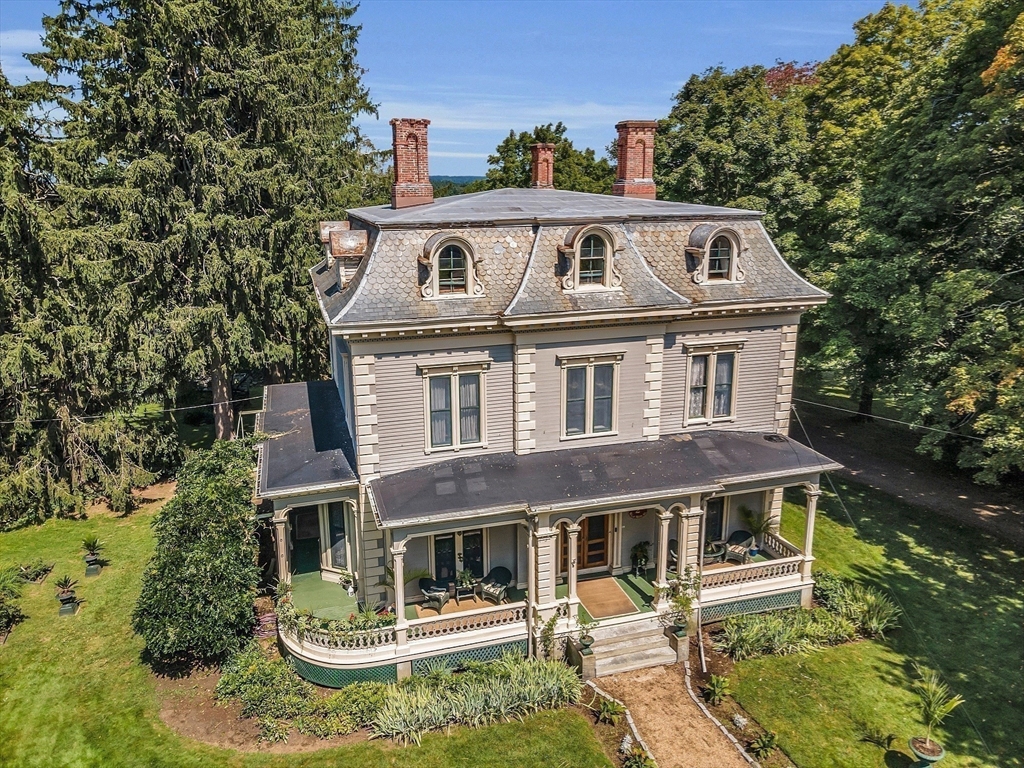 2 West Main Street Brookfield, MA 01506 - Photo 2 of 42 a front view of a house with balcony