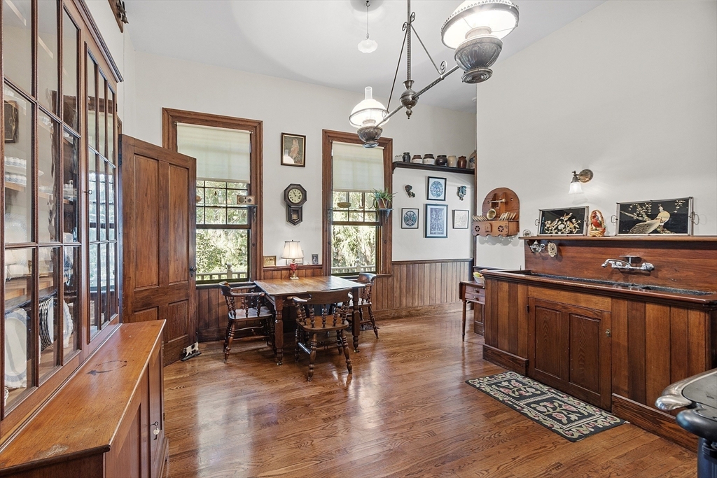 2 West Main Street Brookfield, MA 01506 - Photo 23 of 42 a view of a dining room with furniture window and wooden floor