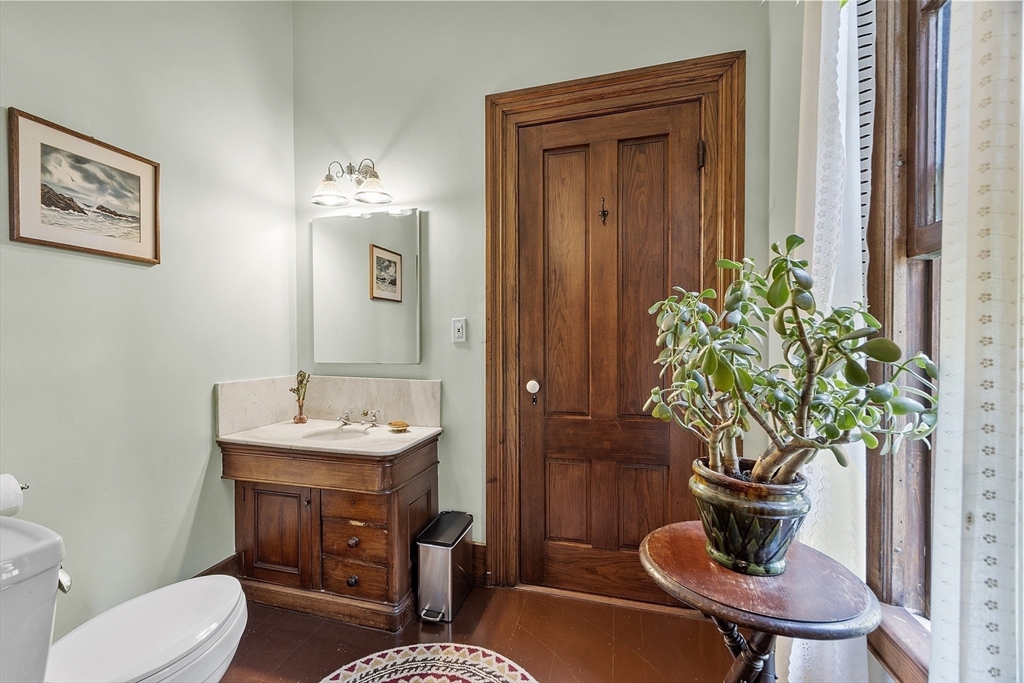 2 West Main Street Brookfield, MA 01506 - Photo 39 of 42 a bathroom with a toilet a sink and a mirror