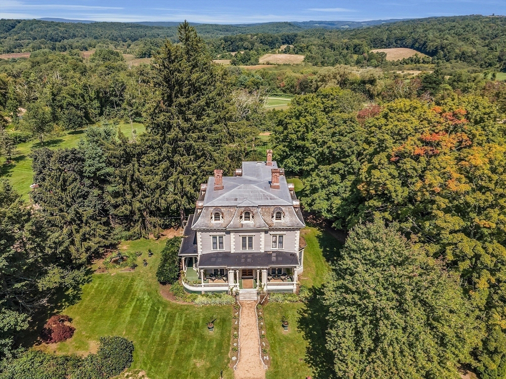 2 West Main Street Brookfield, MA 01506 - Photo 8 of 42 an aerial view of a house with a yard