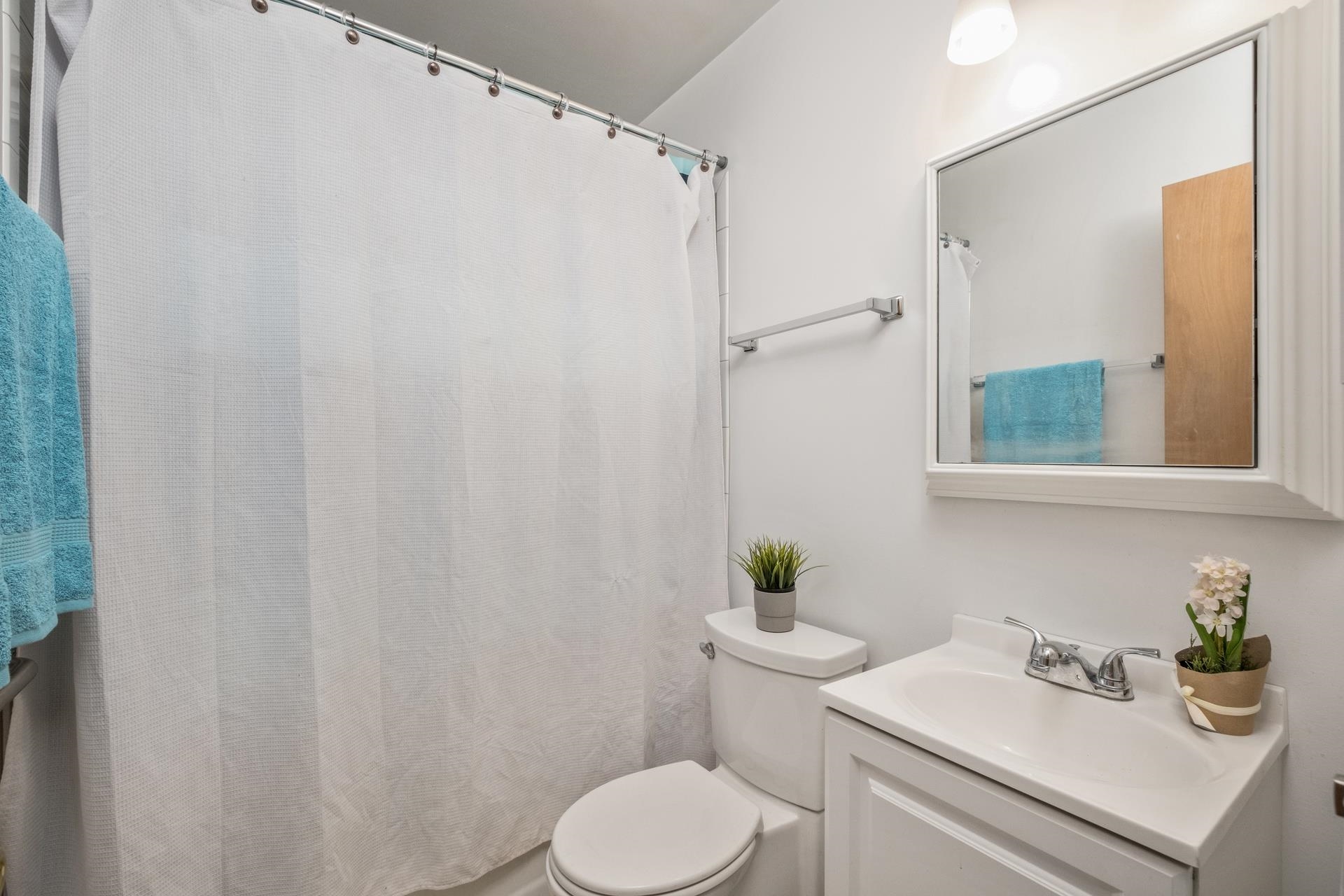 213 Link Road Waynesboro, VA 22980 - Photo 16 of 46 a bathroom with a sink toilet and a mirror