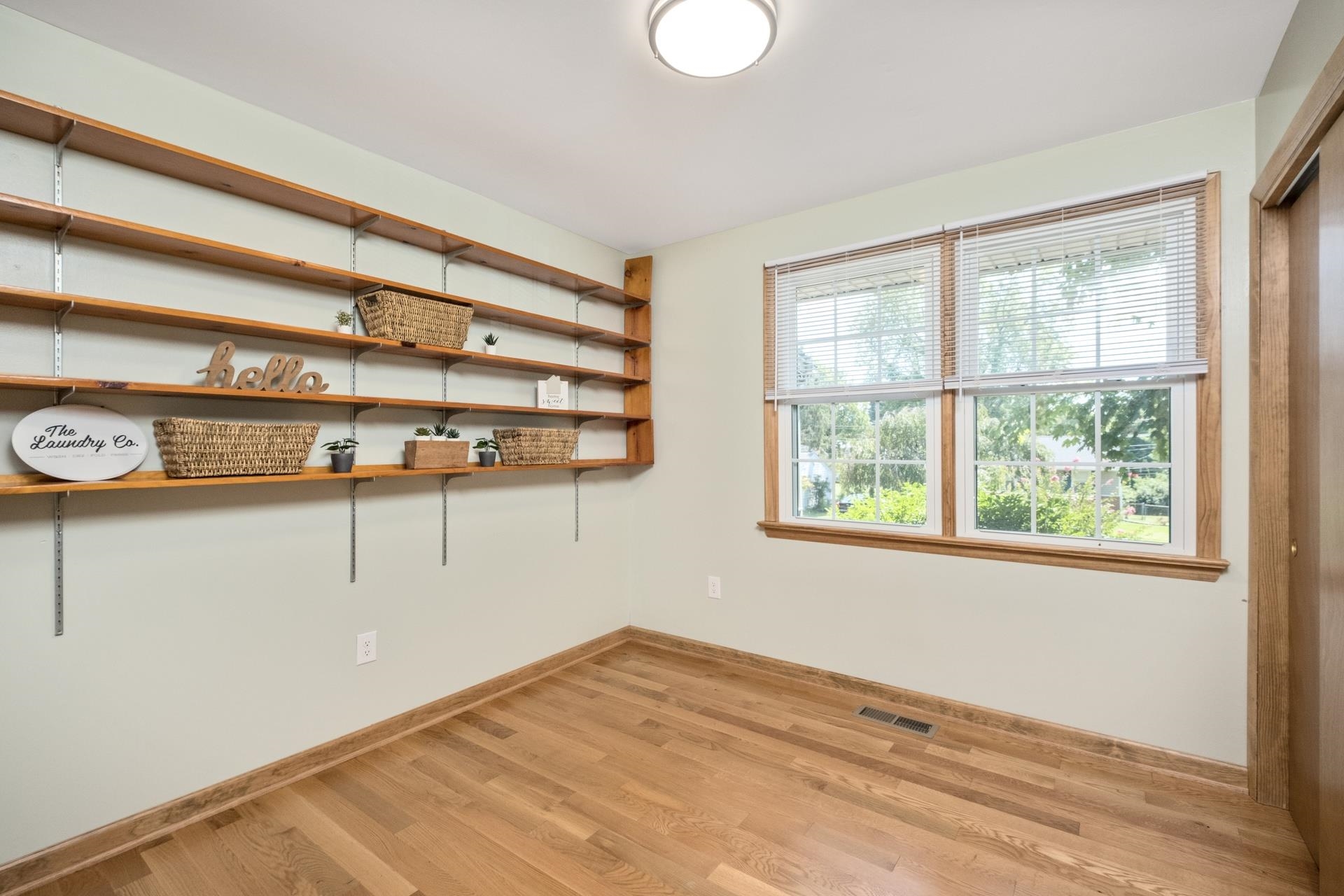 213 Link Road Waynesboro, VA 22980 - Photo 20 of 46 a view of a room with rack on the wall and a window