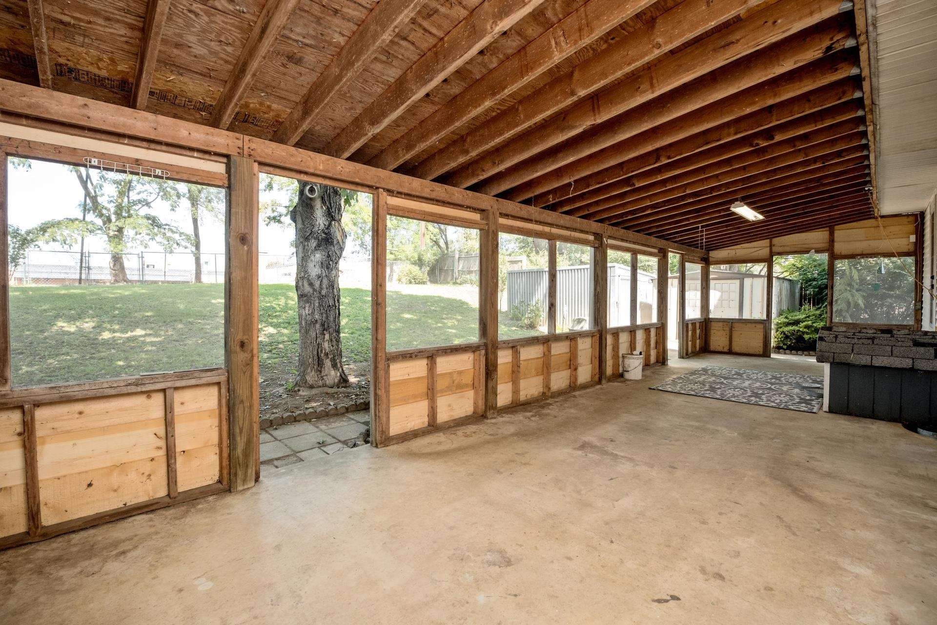 213 Link Road Waynesboro, VA 22980 - Photo 23 of 46 a view of an empty room with a sliding door
