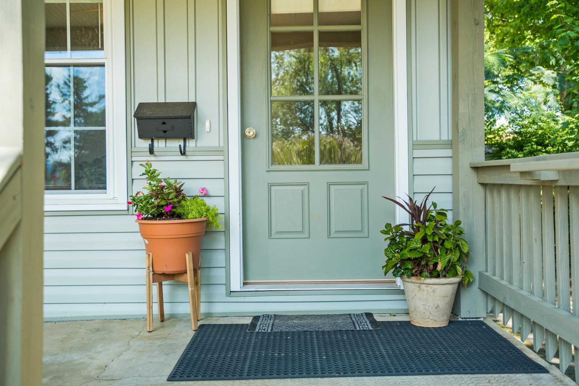 213 Link Road Waynesboro, VA 22980 - Photo 8 of 46 a view of a porch with chairs and potted plants
