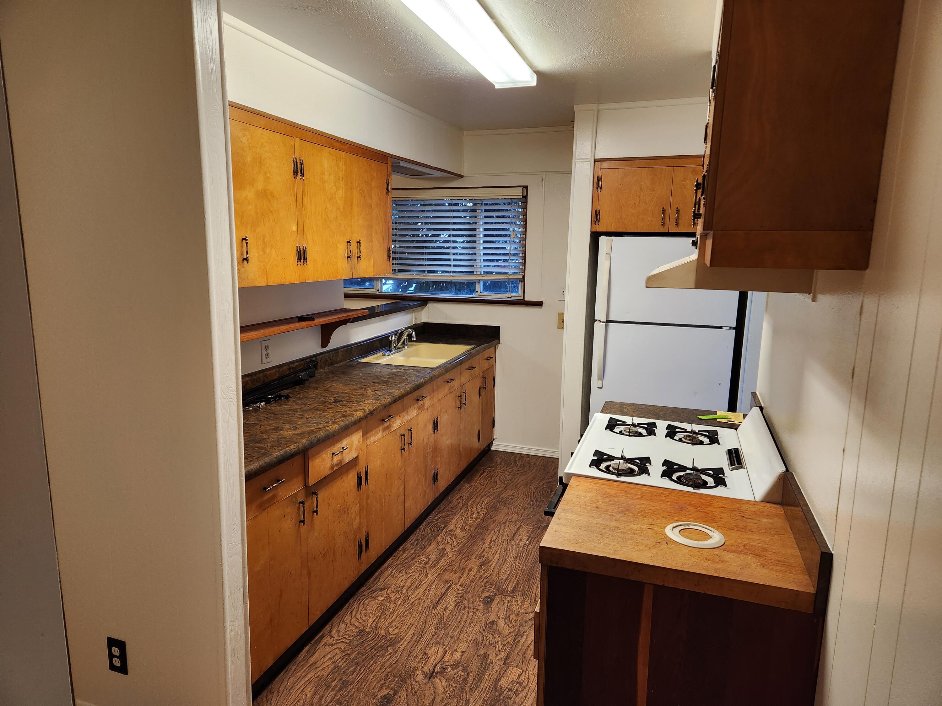2163 Fern Street Cutten, CA 95503 - Photo 16 of 23 a kitchen with stainless steel appliances a stove a sink and a refrigerator