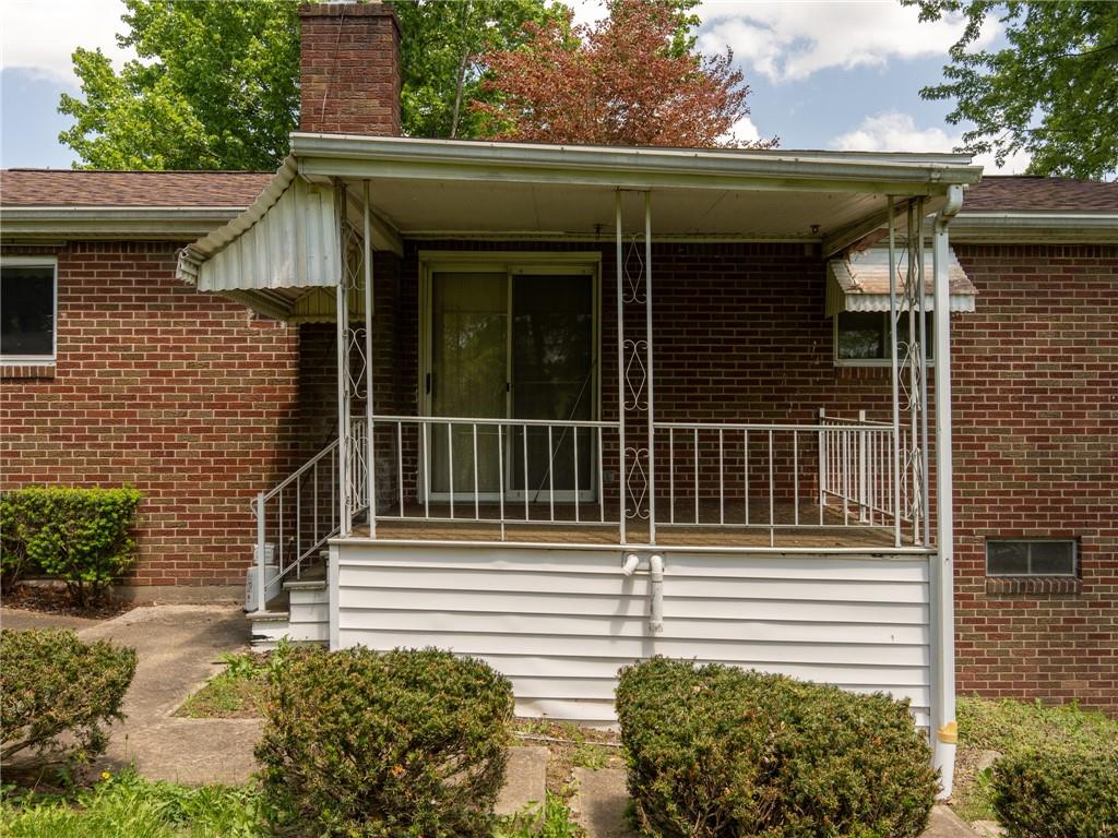 128 Clover Drive Monaca, PA 15061 - Photo 15 of 19 a view of a house with a small yard