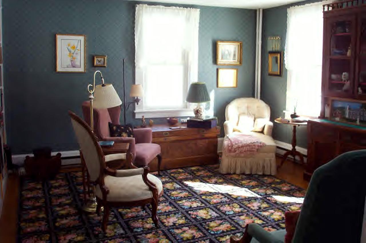 685 W Road Lee, MA 01238 - Photo 5 of 7 a living room with furniture fireplace and a window