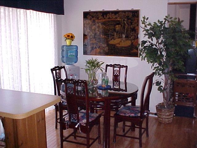 1138 Kilmer Road Tobyhanna, PA 18466 - Photo 6 of 15 a view of a dining room with furniture and wooden floor