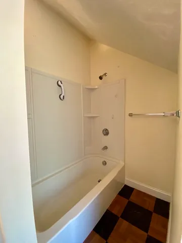 a bathroom with a bathtub
