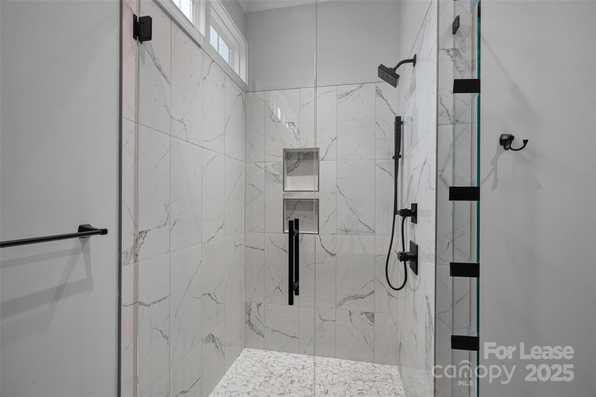 805 Naples Drive Davidson, NC 28036 - Photo 13 of 16 a bathroom with a shower