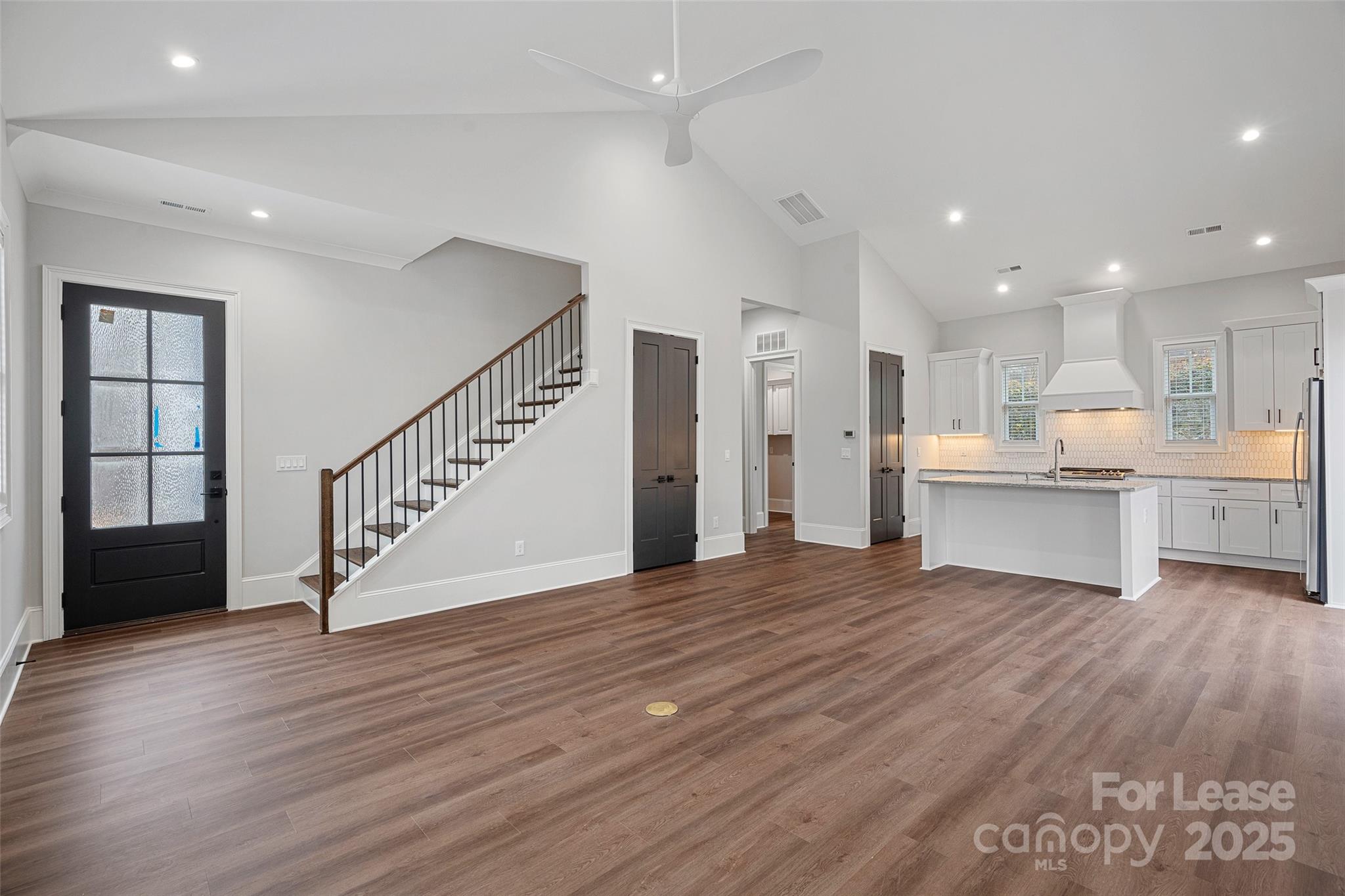 805 Naples Drive Davidson, NC 28036 - Photo 3 of 16 a view of kitchen with wooden floor and electronic appliances