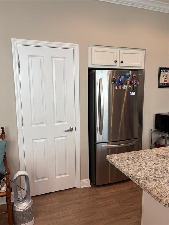 103 Cutlass Way Oldsmar, FL 34677 - Photo 12 of 20 a view of a kitchen with furniture and wooden floor