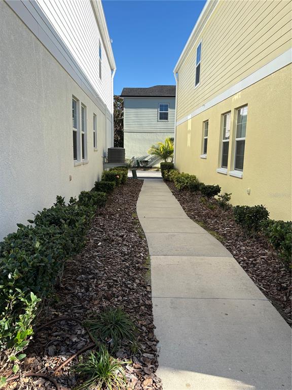 103 Cutlass Way Oldsmar, FL 34677 - Photo 7 of 20 a front view of a house with garden