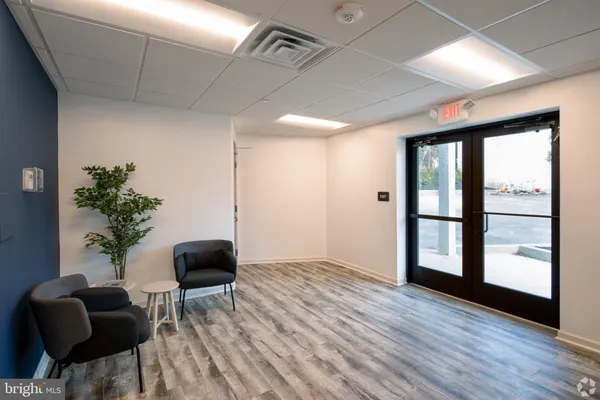 a workspace with furniture and window