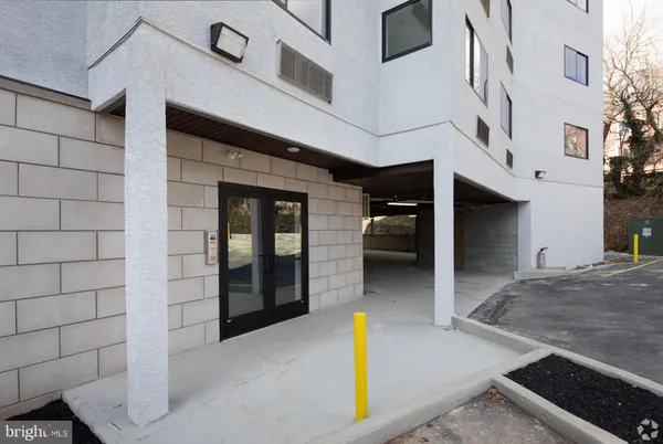 a view of a street with building
