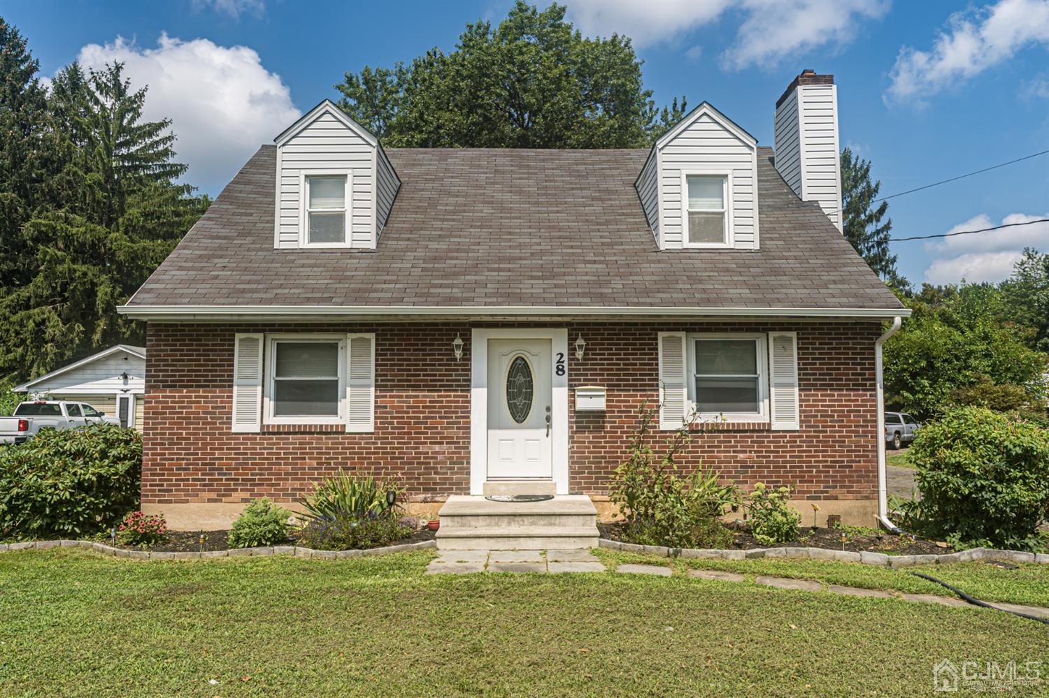 28 West Upper Ferry Road Ewing, NJ 08628 - Photo 1 of 19 a front view of a house with a yard