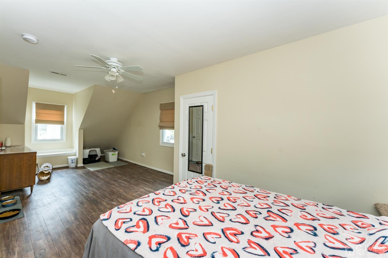 28 West Upper Ferry Road Ewing, NJ 08628 - Photo 15 of 19 a bedroom with a bed and wooden floor