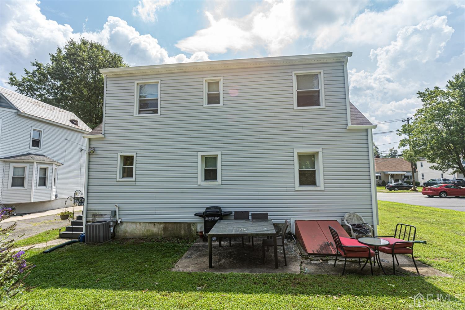 28 West Upper Ferry Road Ewing, NJ 08628 - Photo 17 of 19 a backyard of a house with seating space