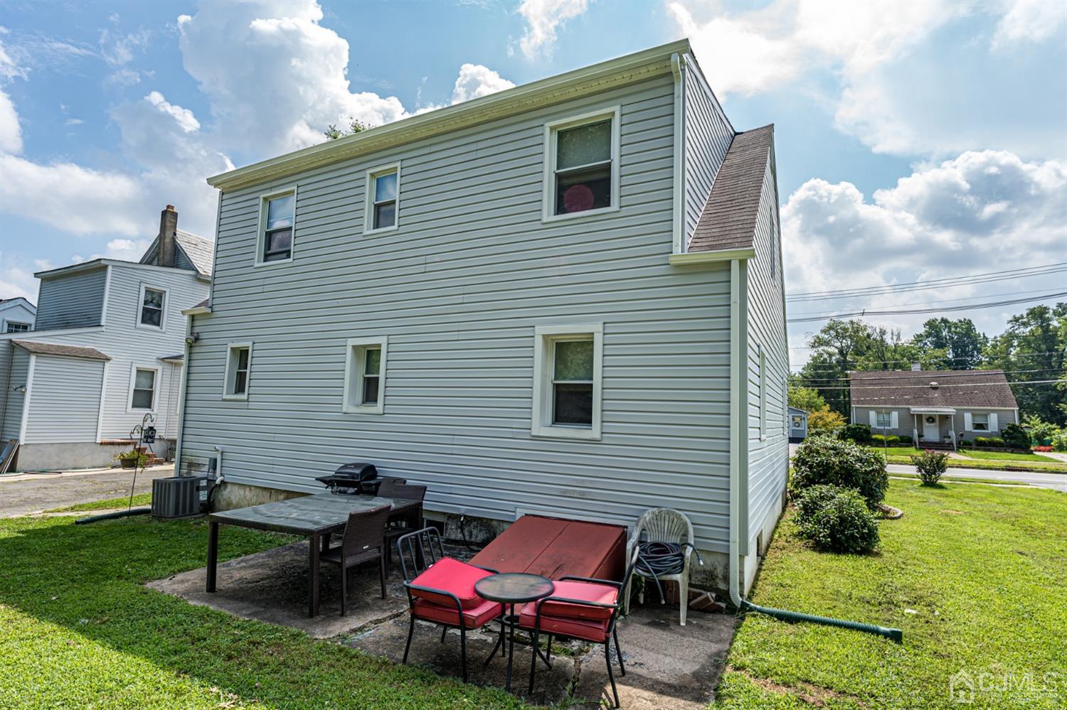 28 West Upper Ferry Road Ewing, NJ 08628 - Photo 18 of 19 a backyard of a house with seating space