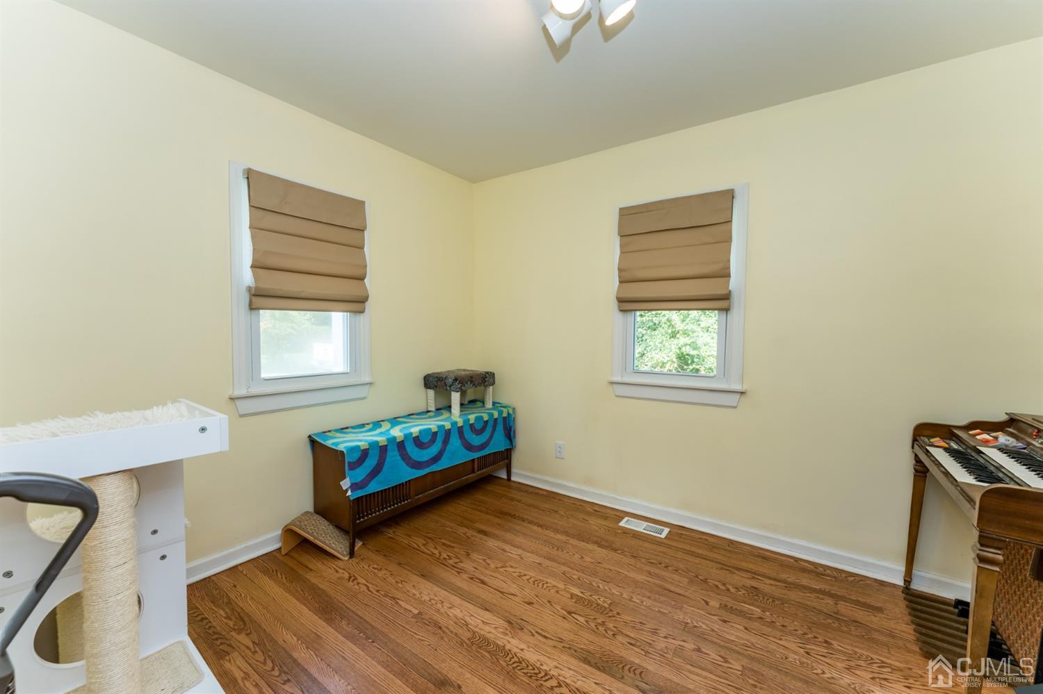 28 West Upper Ferry Road Ewing, NJ 08628 - Photo 10 of 19 a view of a room with toys and wooden floor