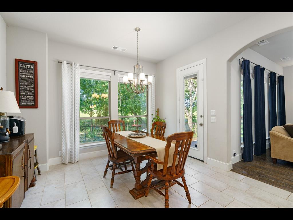 191 Daniel Drive Van Alstyne, TX 75495 - Photo 10 of 32 a view of a dining room with furniture window and outside view