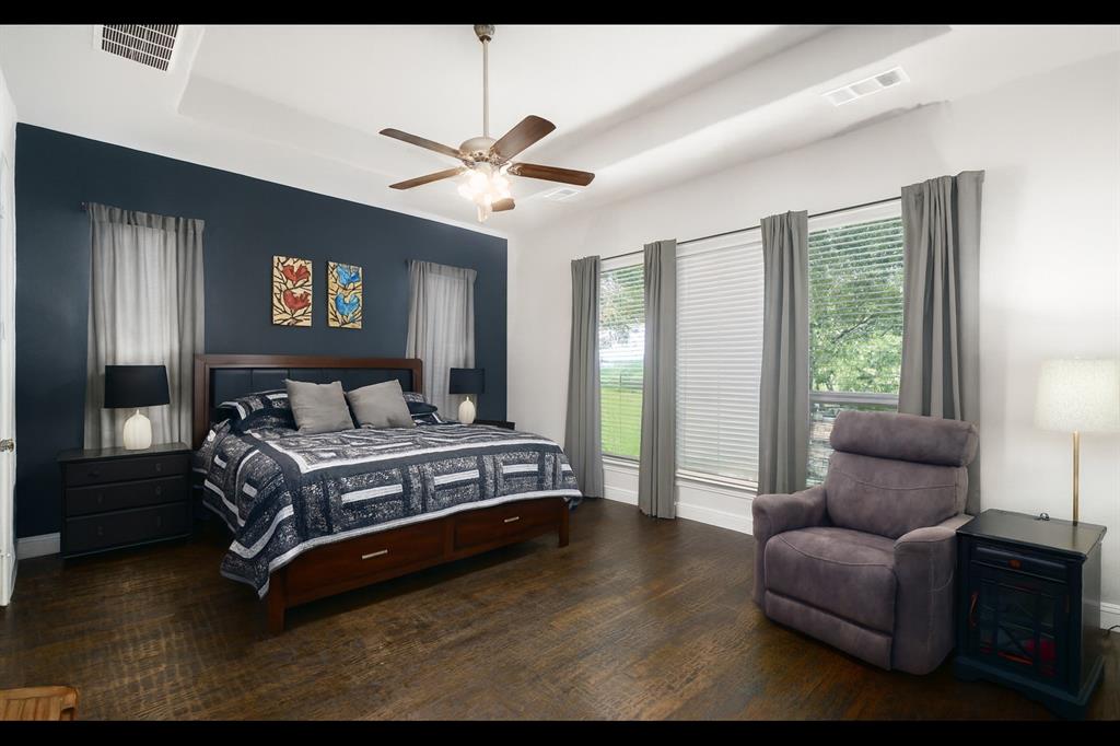 191 Daniel Drive Van Alstyne, TX 75495 - Photo 13 of 32 a bedroom with a bed couch and a window