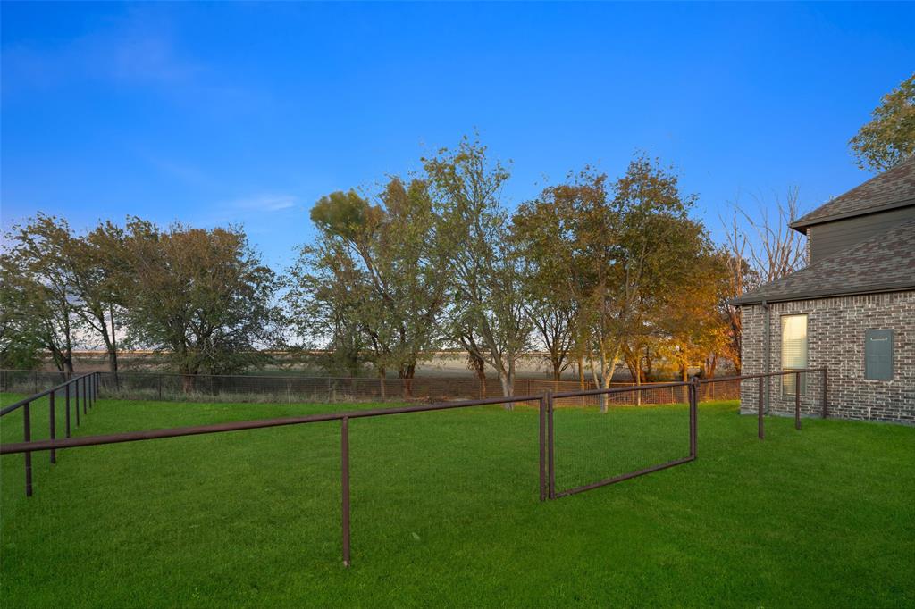 191 Daniel Drive Van Alstyne, TX 75495 - Photo 26 of 32 a view of a park with large trees