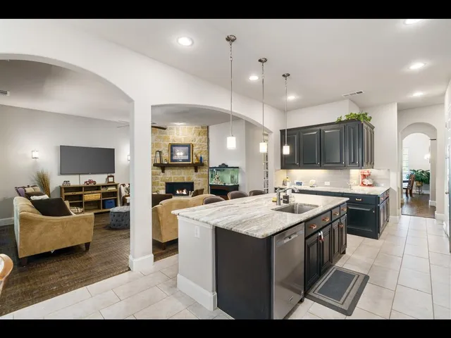 a view of a park with large trees