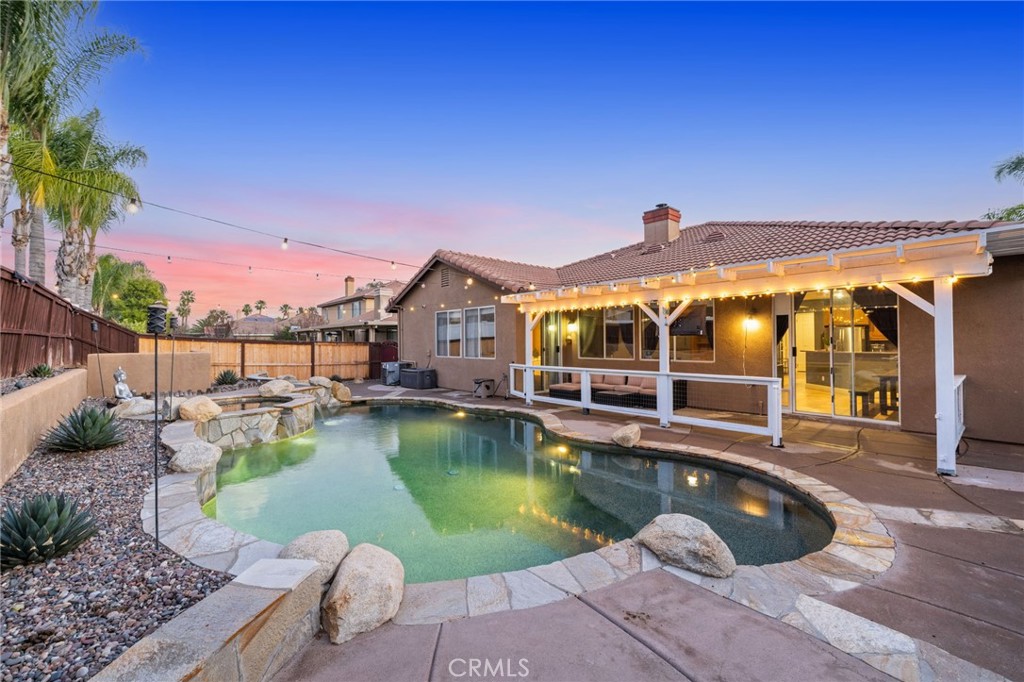 36622 Chantecler Road Winchester, CA 92596 - Photo 1 of 1 a view of a house with swimming pool and sitting area