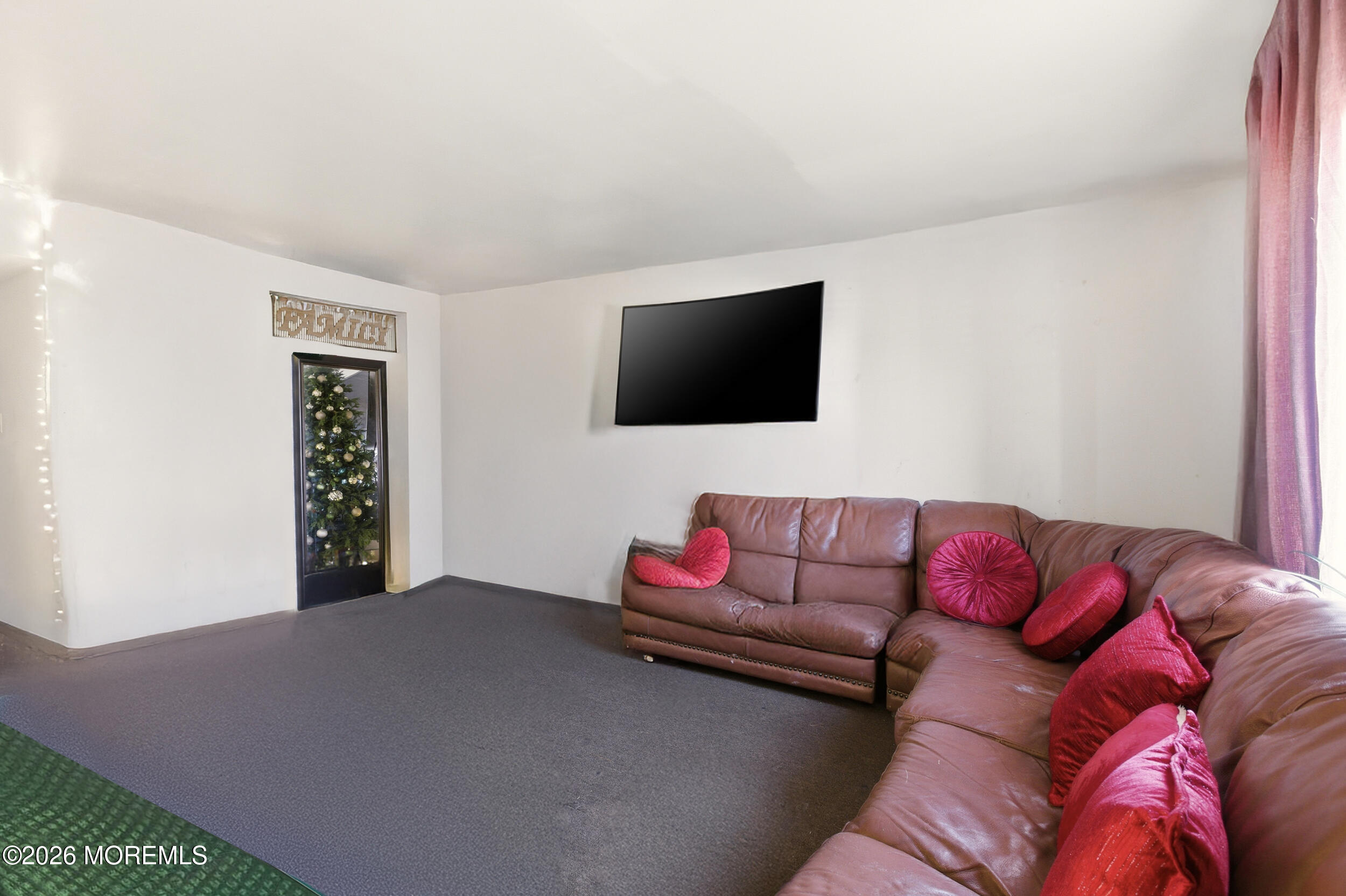 201 Sawmill Road Brick, NJ 08724 - Photo 6 of 17 a living room with furniture and a flat screen tv
