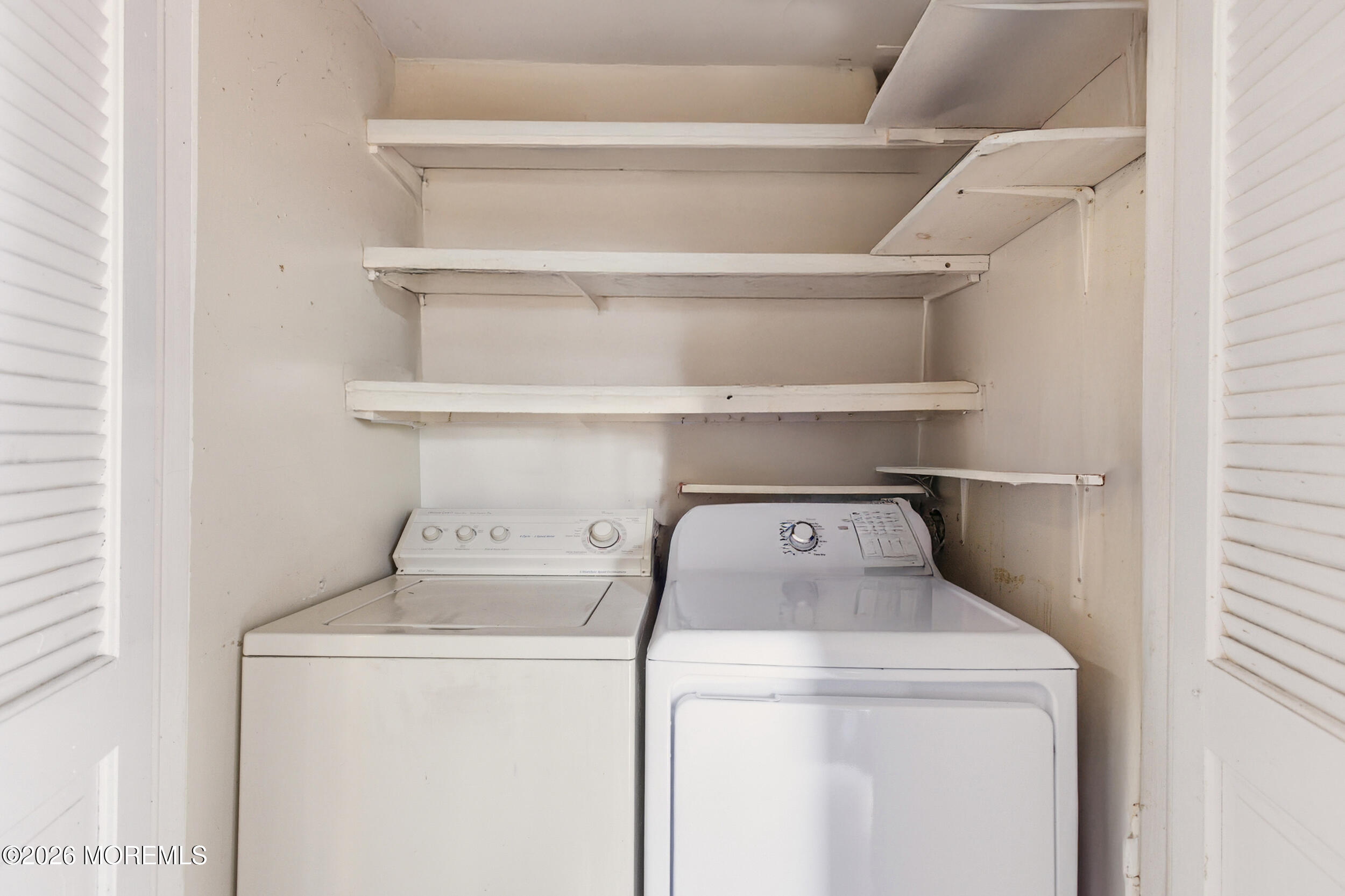 201 Sawmill Road Brick, NJ 08724 - Photo 10 of 17 a view of storage and utility room with washer and dryer