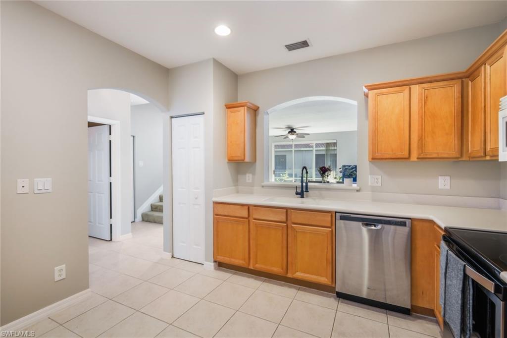 10004 Ravello Boulevard Fort Myers, FL 33905 - Photo 11 of 42 a spacious bathroom with a double vanity sink a mirror and a bathtub
