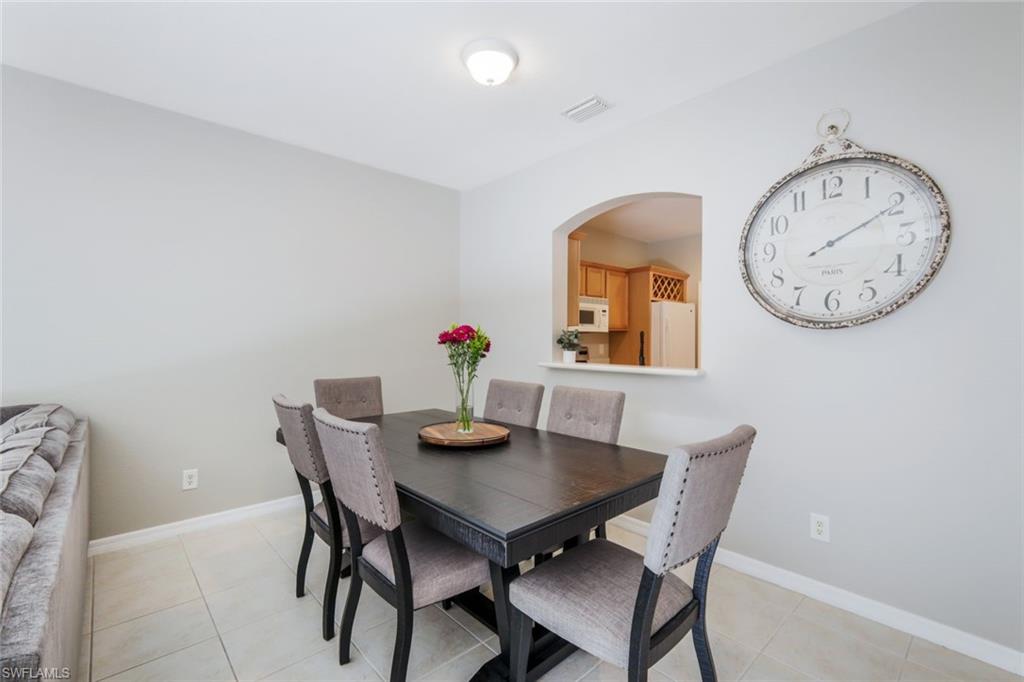 10004 Ravello Boulevard Fort Myers, FL 33905 - Photo 13 of 42 a view of a dining room with furniture