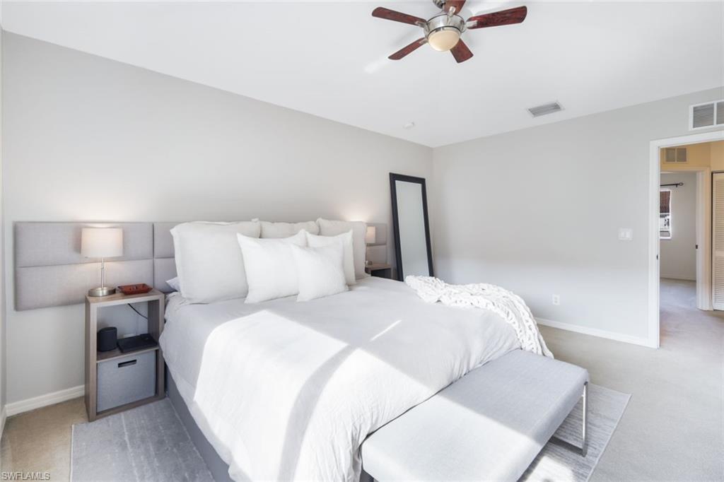 10004 Ravello Boulevard Fort Myers, FL 33905 - Photo 16 of 42 a bedroom with a bed and window