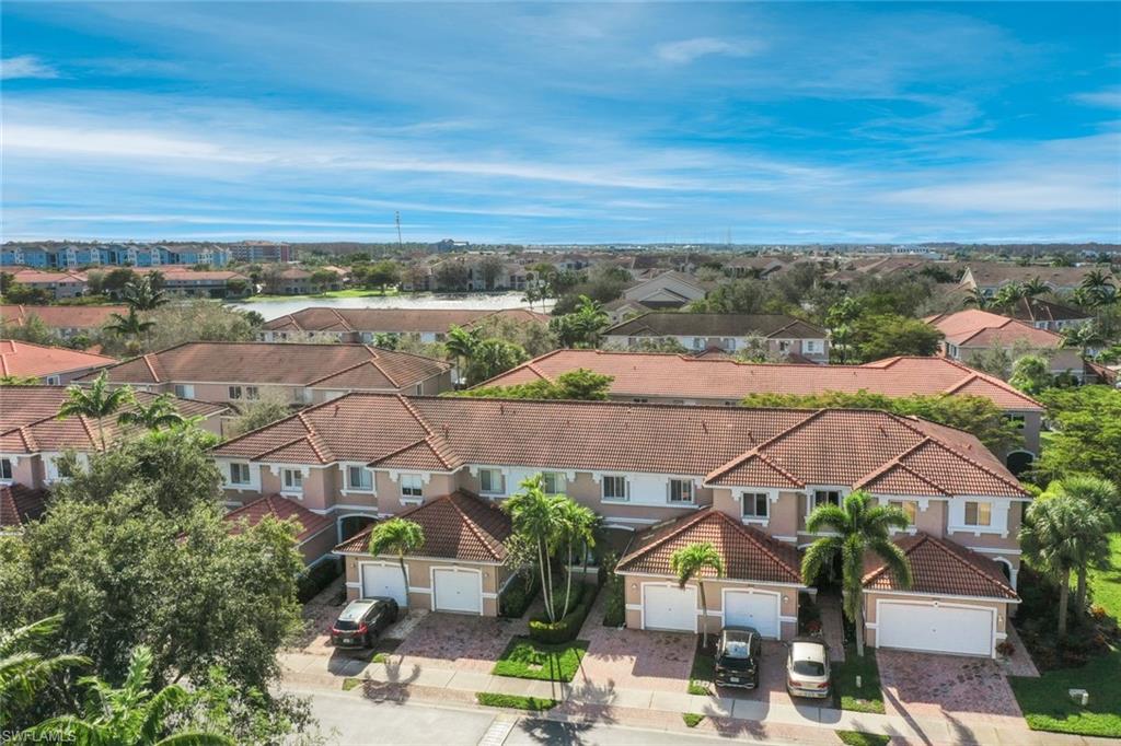 10004 Ravello Boulevard Fort Myers, FL 33905 - Photo 30 of 42 an aerial view of a houses with a lake view
