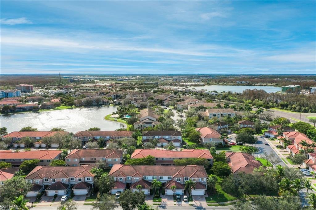 10004 Ravello Boulevard Fort Myers, FL 33905 - Photo 31 of 42 an aerial view of residential building and lake