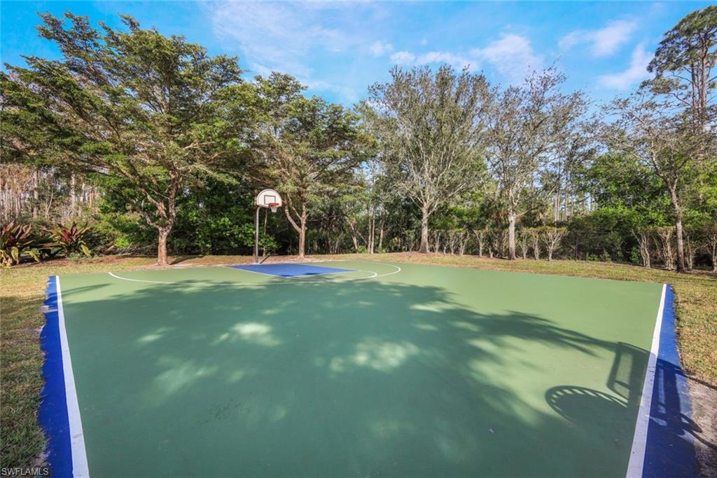 10004 Ravello Boulevard Fort Myers, FL 33905 - Photo 39 of 42 a view of a park with large trees